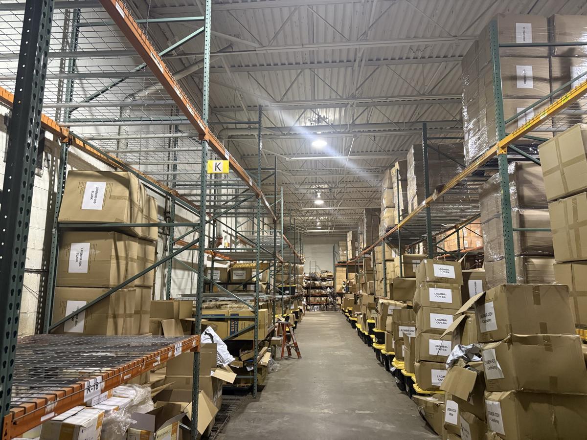 Warehouse aisle under bright lights